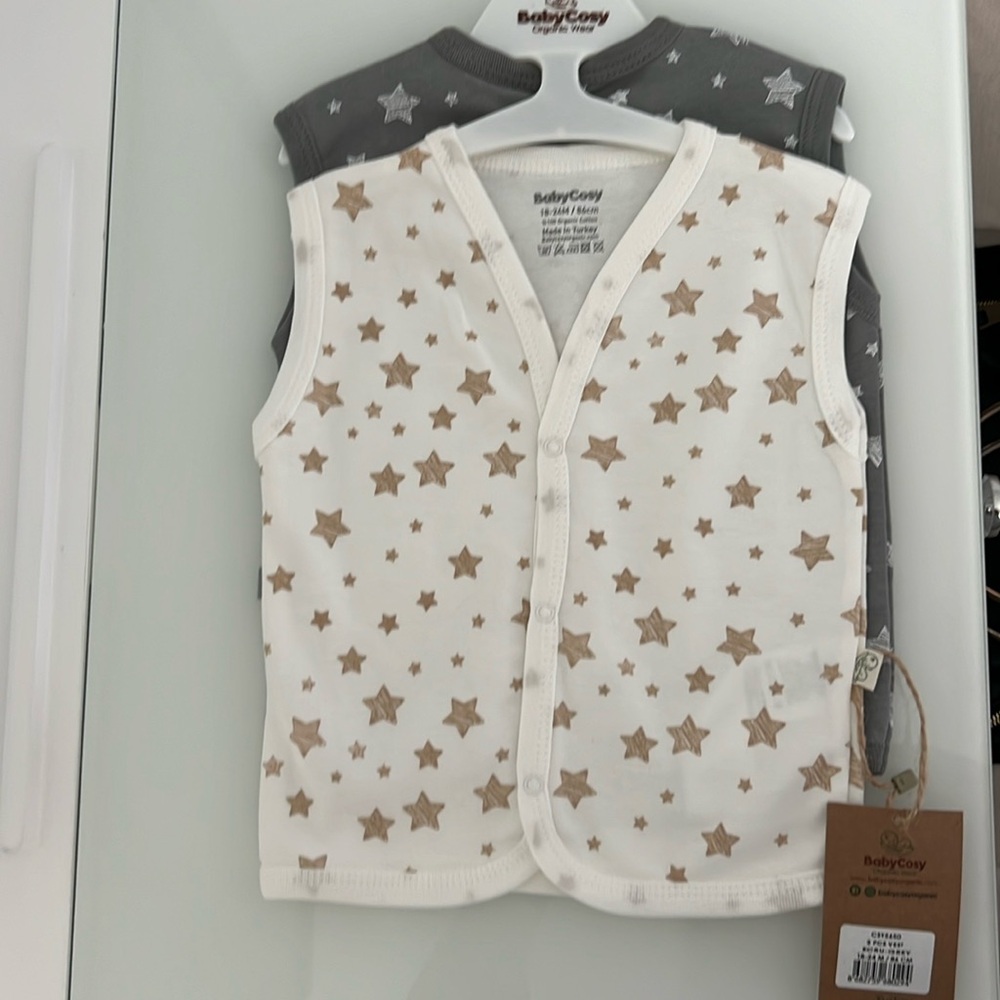 Stylish and Cozy: Organic Cotton Star Pattern 2 Pc Vest Set for Your Little One.